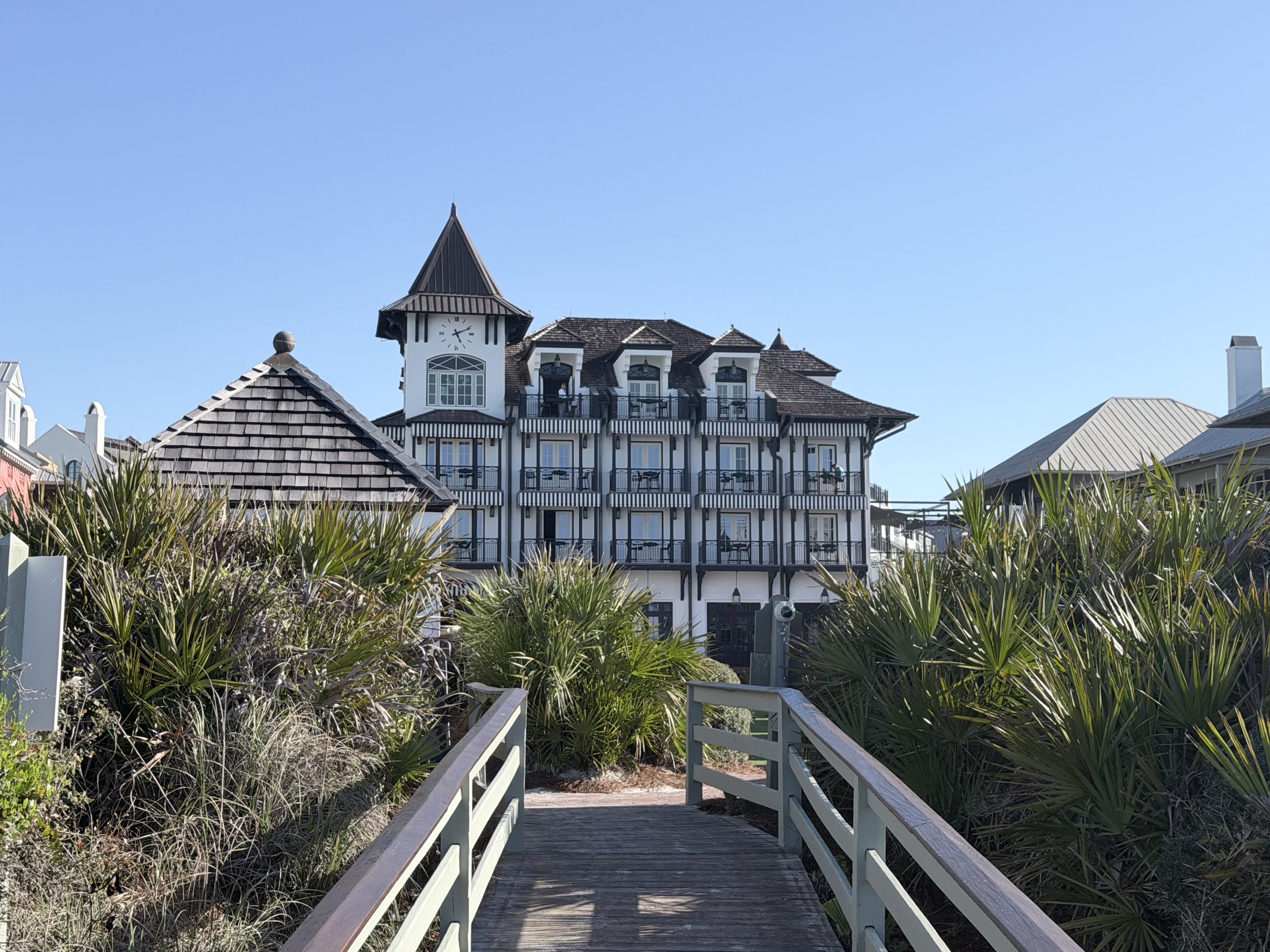 Rosemary Beach Guide: The Pearl Hotel clock tower from the beach boardwalk on 30A