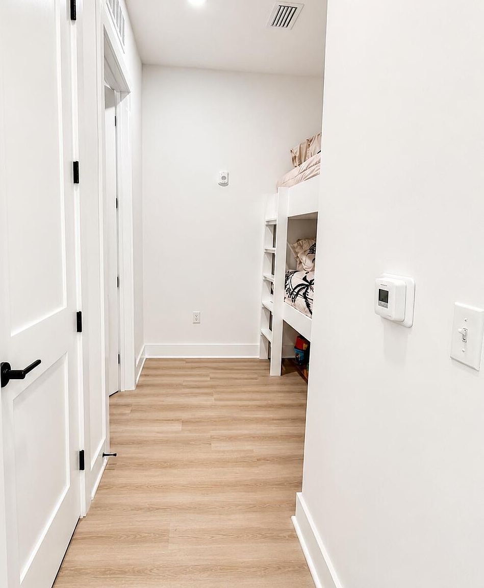 Hallway bunk beds in Unit 218, 319 The Grove Dr, Miramar Beach